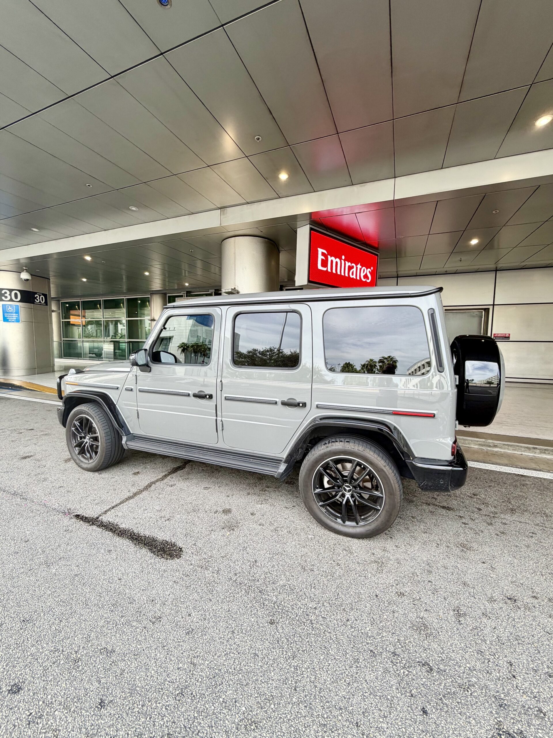Cadillac Escalade ESV delivered to the arrival terminal at Miami International Airport MIA